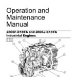 Perkins Maintenance Manual 2806F-E18TA and 2806J-E18TA' on a wooden surface, surrounded by tools and engine components.