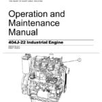 Cover page of the Perkins engine 404J-22 operation and maintenance manual. The image shows a close-up of the engine, with the Perkins logo in the top left corner and the engine model and manual title in the center. The engine features a black and silver metal exterior with various components visible, including hoses, bolts, and a fan.